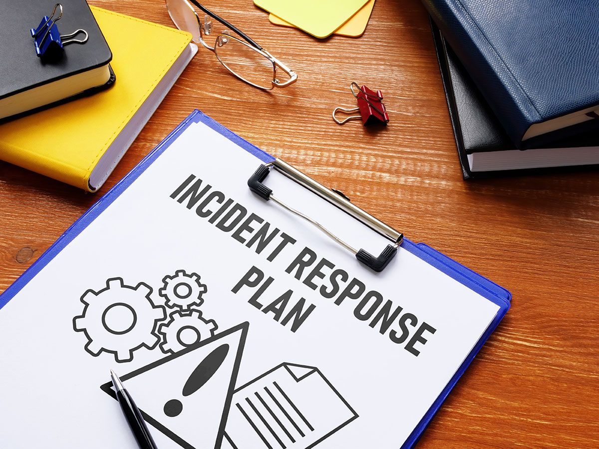 Clipboard with incident response plan document